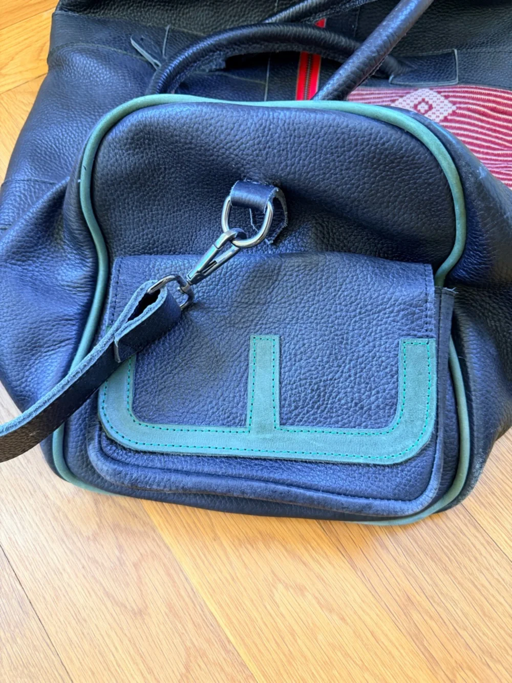 Black Leather Duffel Bag with Red Woven Center Panel